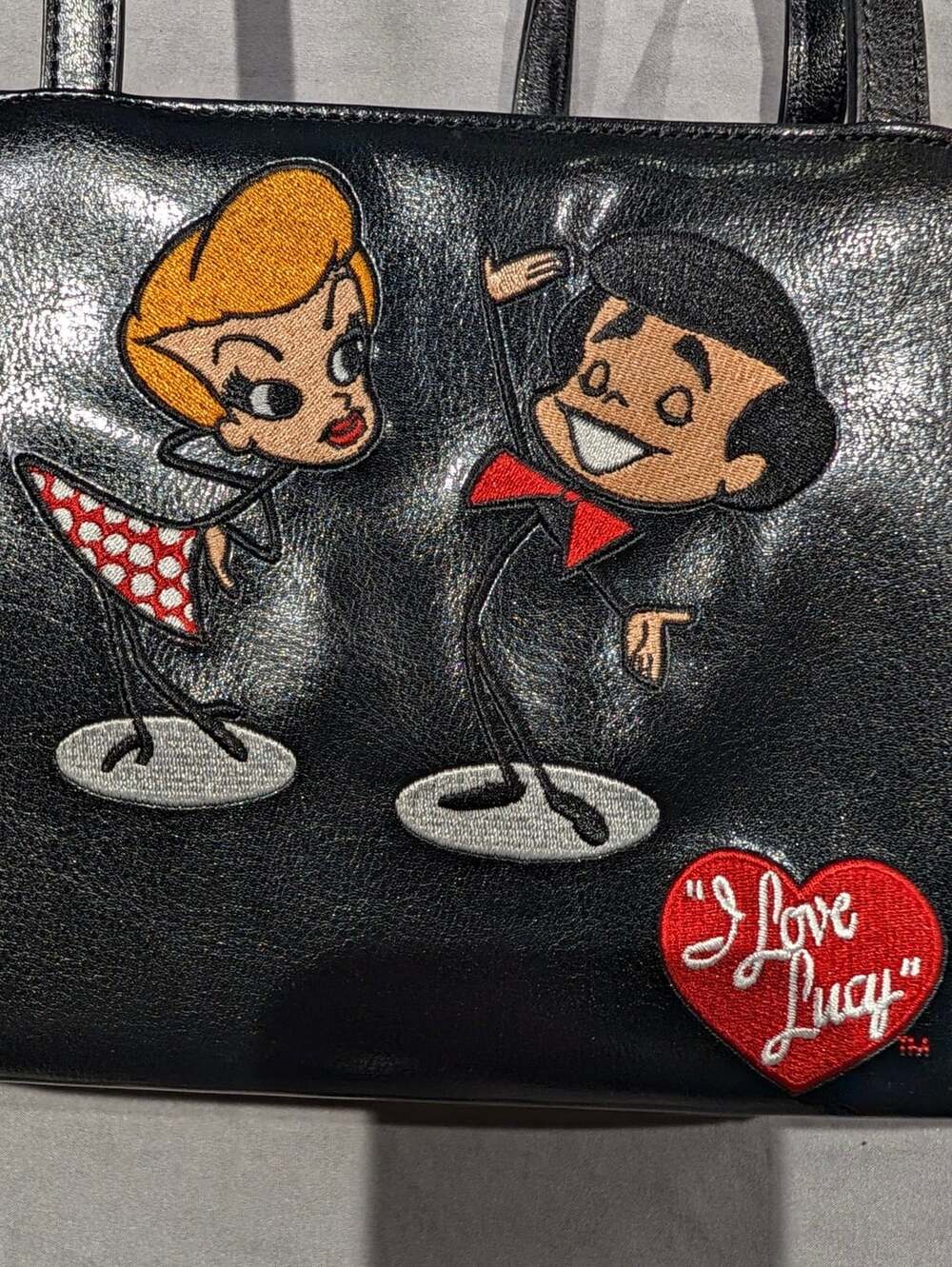 I Love Lucy Black Handbag With Embroidered Characters And Dust Bag